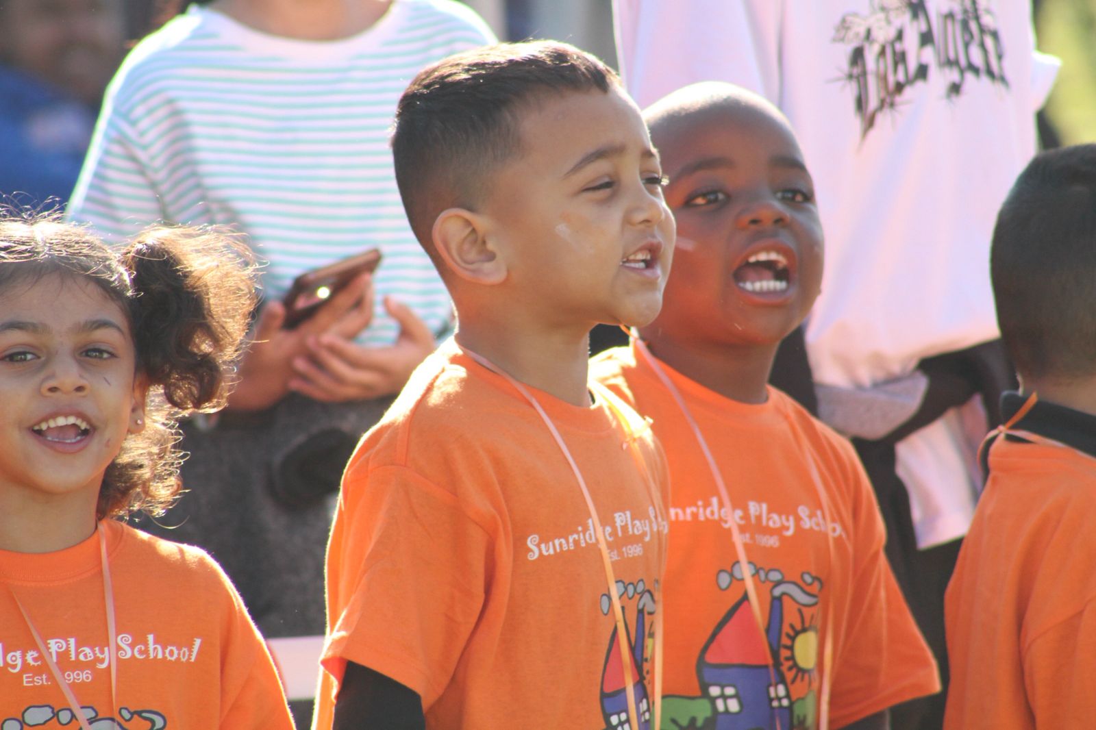 Students expressing happiness and unity